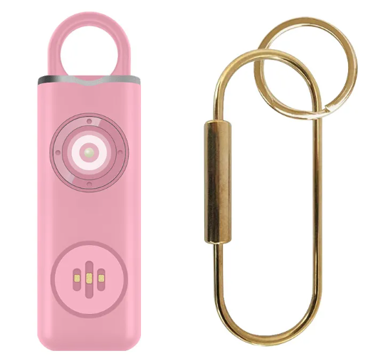 Pink electronic device with a gold keychain on a white background
